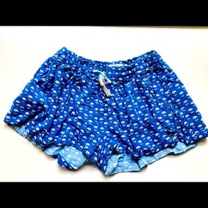 Mini Boden blue shorts with flowers. Pockets.